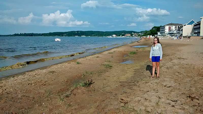 the beach water at traverse city state park